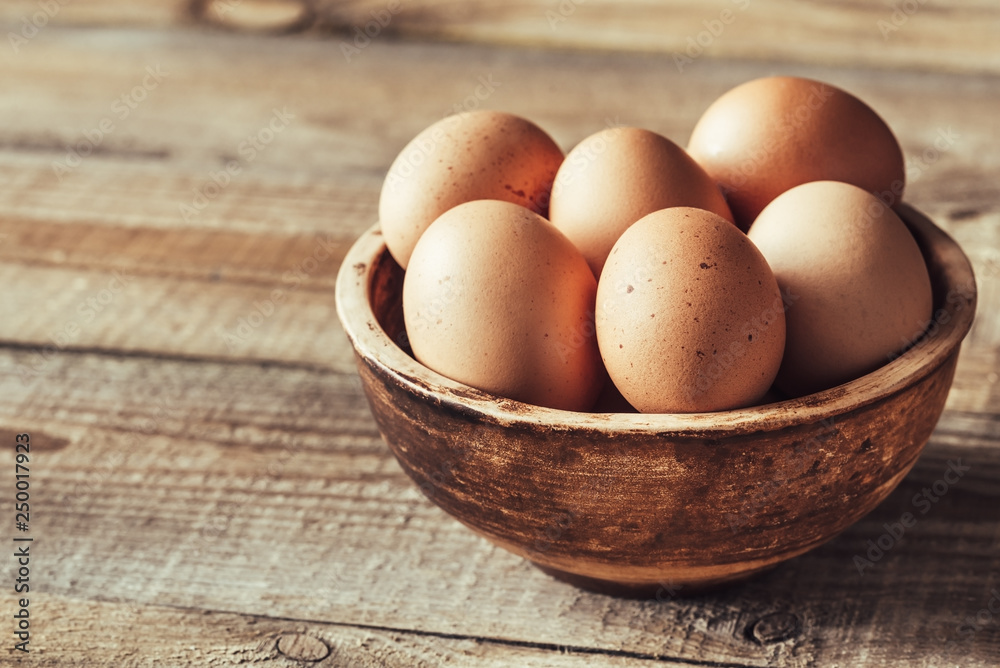 Bowl of raw chicken eggs