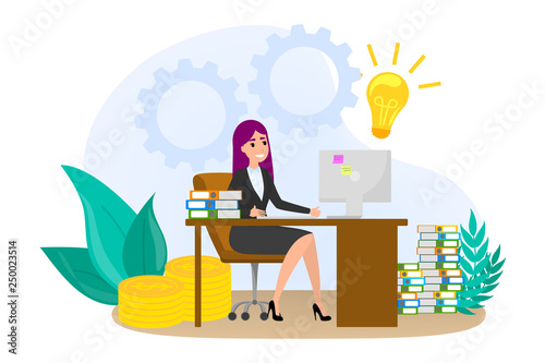 Woman sitting at the desk in suit