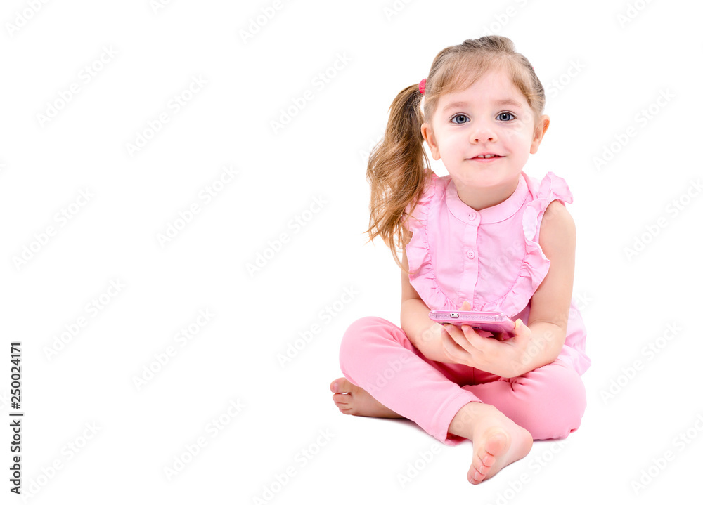 Little cute girl sitting with mobile phone isolated on white background Little cute girl sitting with mobile phone isolated on white background