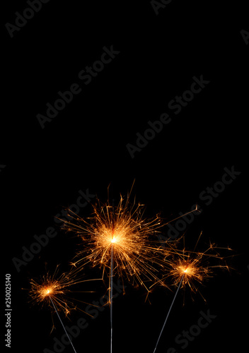 Party sparklers isolated on black background