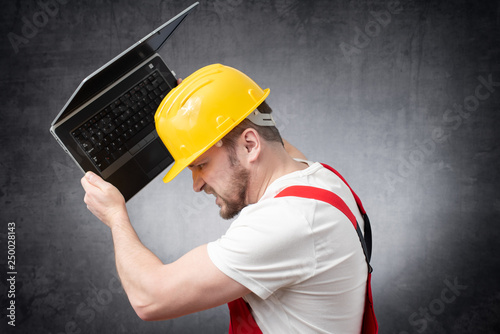Construction worker with laptop