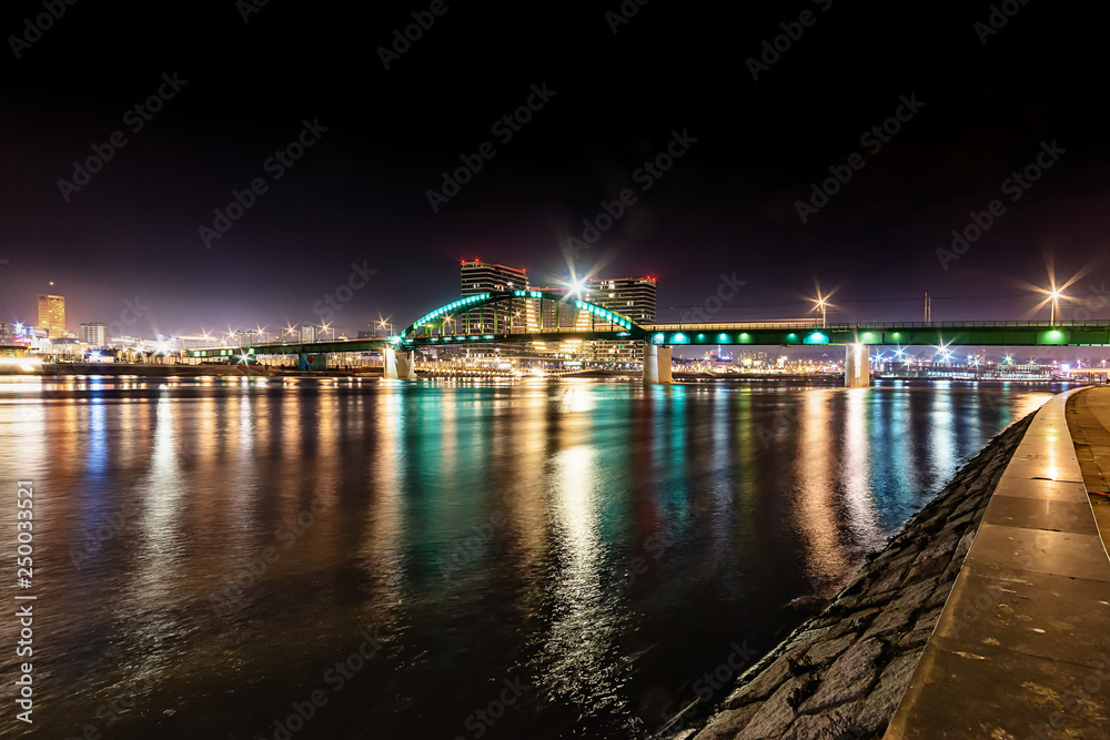 Belgrade, Serbia - February 10, 2019: A panorama of Belgrade seen from the banks of the Sava River. Old bridge and waterfront of Belgrade.