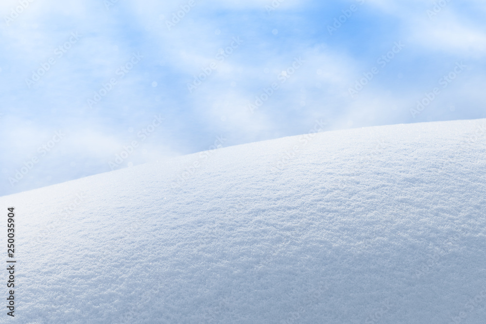 The wavy surface of the snow - a beautiful winter frosty background