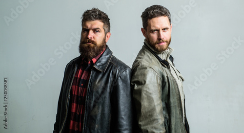 Masculinity and brutality. Feel confident in brutal leather clothes. Brutal men wear leather jackets. Men brutal bearded hipster. Handsome stylish and cool. Masculine and brutal friends. Bully team