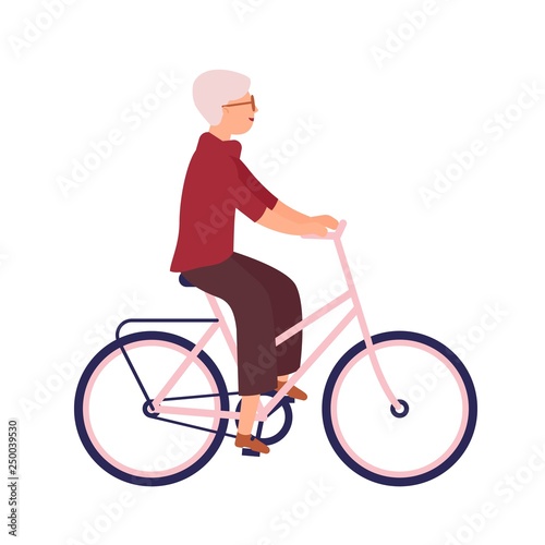 Pretty elderly woman dressed in casual clothes riding bike. Cute smiling old ...