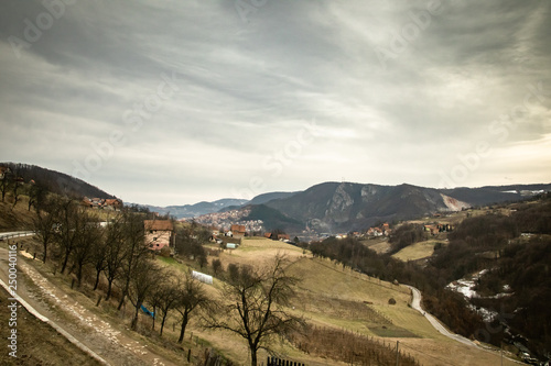 Mountain range near the Uzice town in Serbia. Winter cloudy day.