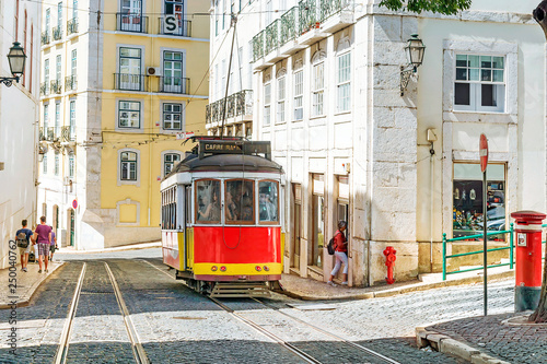 Lisbon, Portugal.Red retro streetcar in the streets in Lisbon