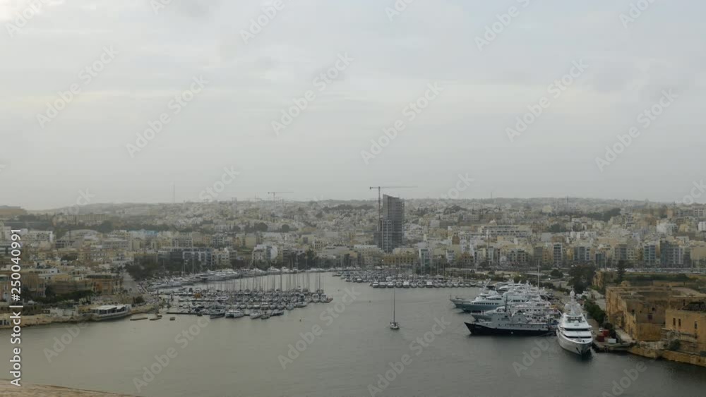 Shot of the Ferry Terminal in Sliema from Valetta, Malta, boats Shot of the Ferry Terminal in Sliema from Valetta, Malta, boats