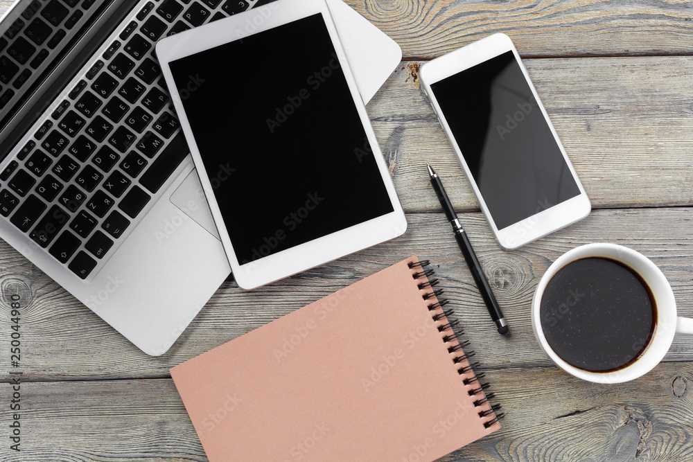 Open laptop with digital tablet and smartphone close up Open laptop with digital tablet and smartphone close up