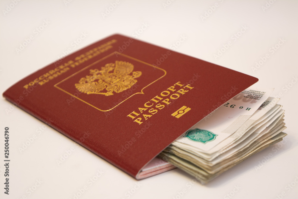 Russian passport and banknotes in denominations of 1 thousand rubles Russian passport and banknotes in denominations of 1 thousand rubles
