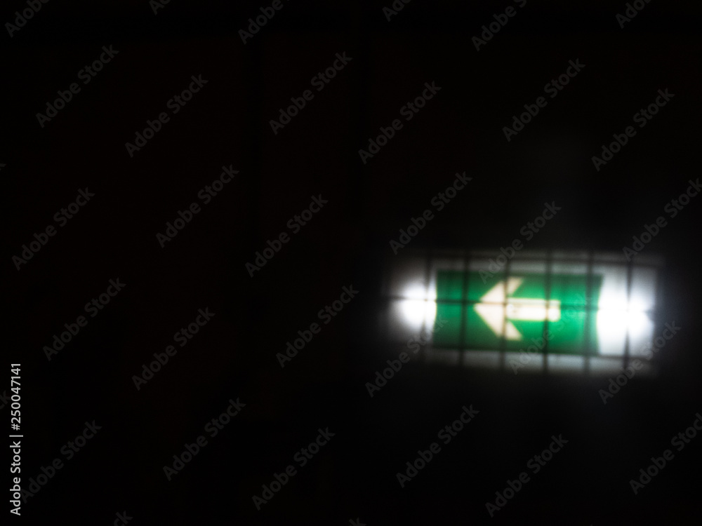 fire exit, sign in the tunnel, blurred fire exit, sign in the tunnel, blurred