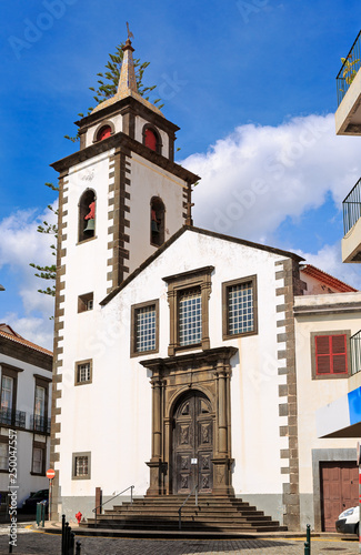 Beautiful vibrant cityscape in the streets of Funchal, Madeira, with the Parish of Sao Pedro on a summer day