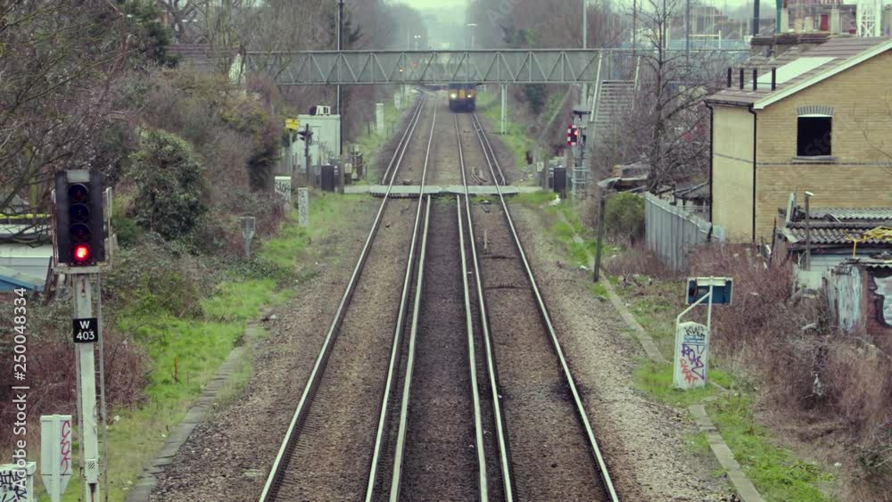 A Train passes a Level crossing in London