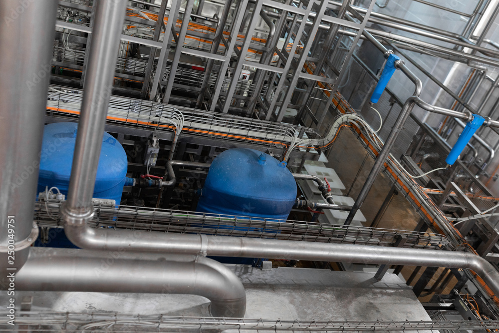 Pipeline and blue tanks. Pressure supply system Pipeline and blue tanks. Pressure supply system