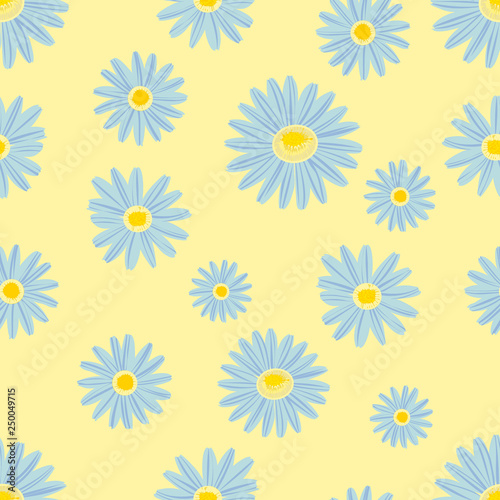 Chamomile flowers on a yellow background. 