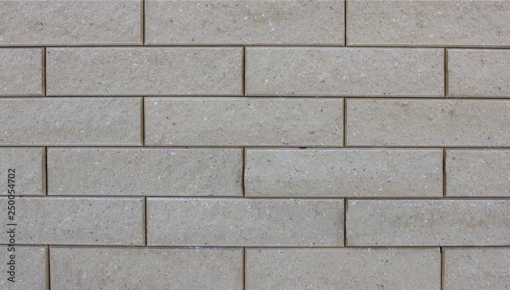 Obraz premium Modern designer brown brick wall, background, texture, architecture