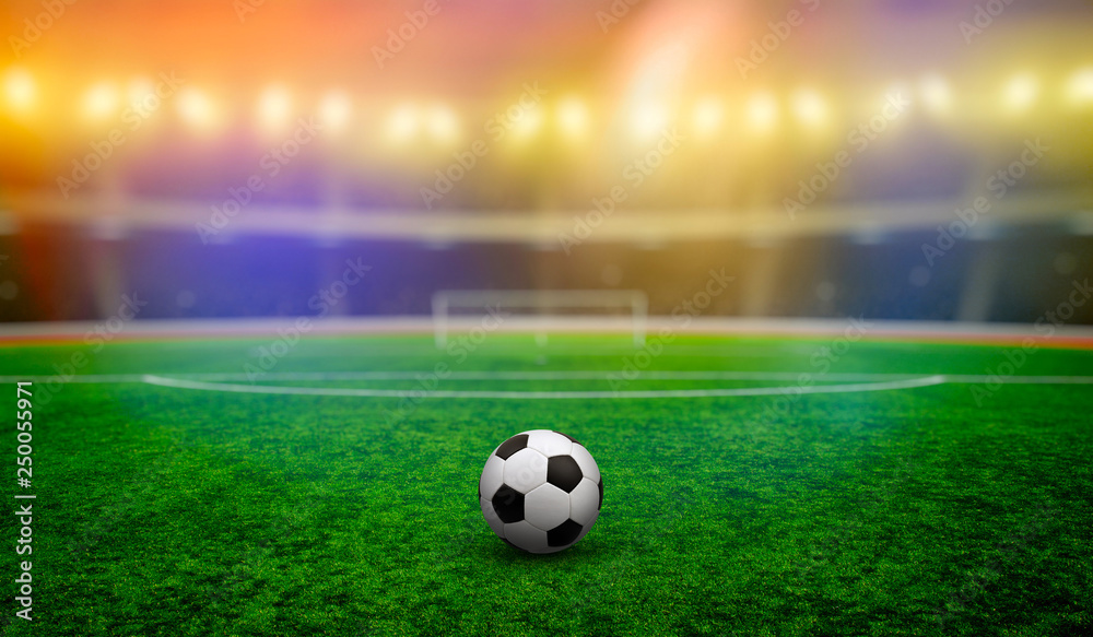 Soccer ball on stadium with illumination Soccer ball on stadium with illumination
