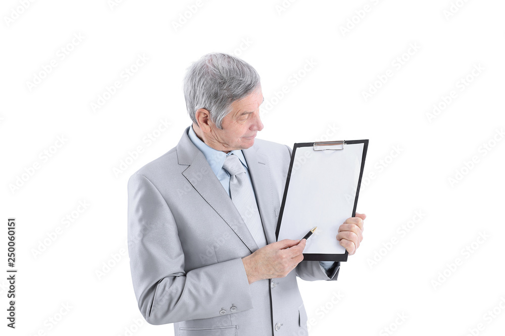Mature businessman pointing at blank sheet.isolated on a white Mature businessman pointing at blank sheet.isolated on a white