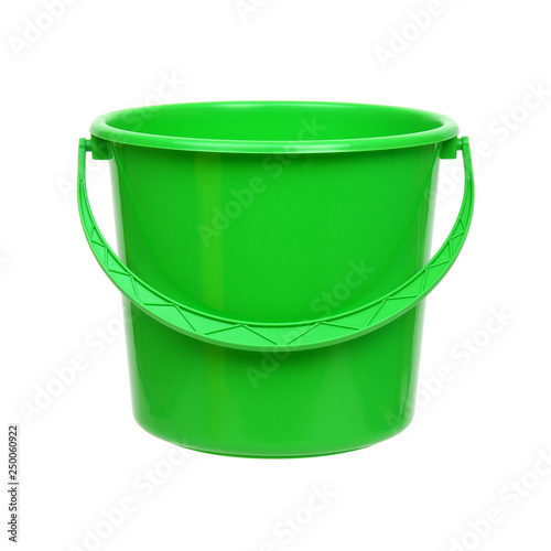 Green plastic bucket on white