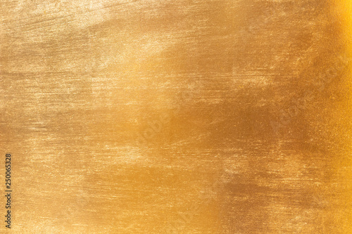 Shiny yellow leaf gold metal texture and background