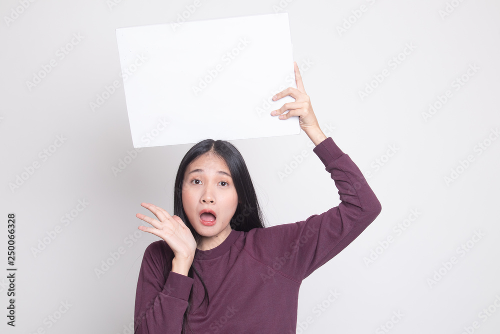 Young Asian woman surprise with white blank sign. Young Asian woman surprise with white blank sign.