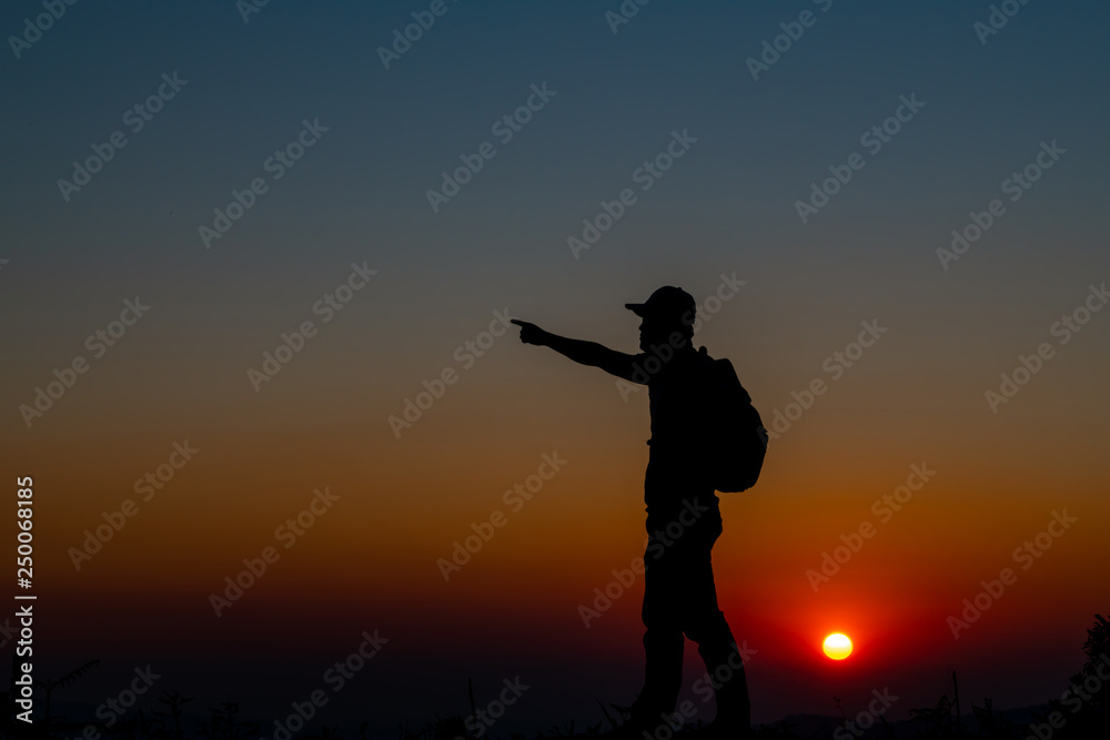 hiking accomplish success silhouette in mountains. hiking accomplish success silhouette in mountains.