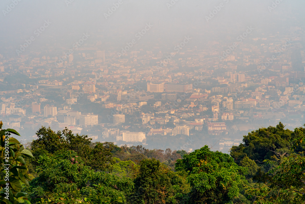 A blurred cityscape of Chiang Mai city as a result of burning season which caused serious air pollution.