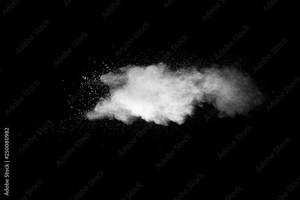 Explosion of white dust on black background. Explosion of white dust on black background.