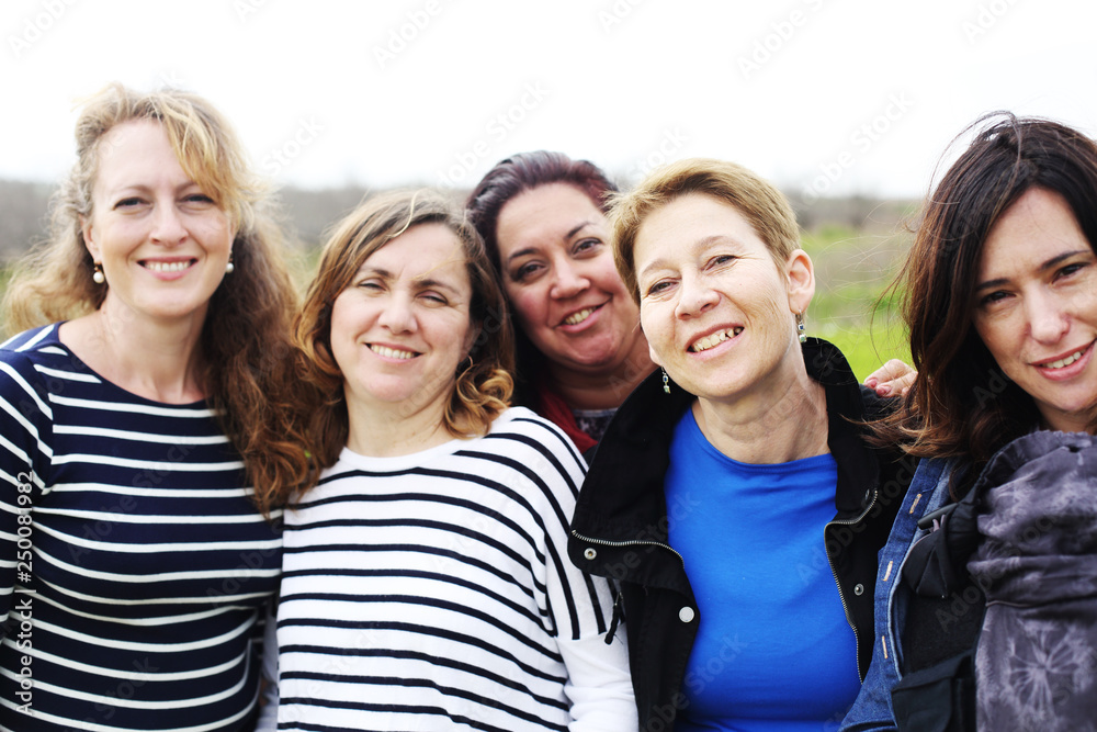 Group of mature beautiful ladies enjoying on a nice day outside Group of mature beautiful ladies enjoying on a nice day outside