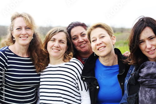 Group of mature beautiful ladies enjoying on a nice day outside