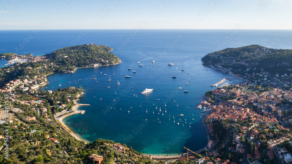 aerial of the bay at villefrance sur mer depicting super yachts and boats in the south of france nice