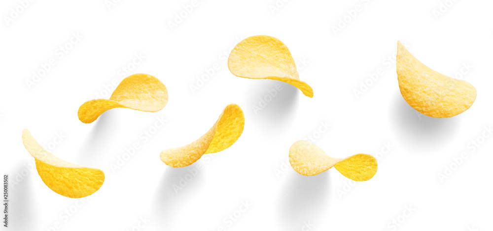 Various potato chips on a white background. Top view Various potato chips on a white background. Top view