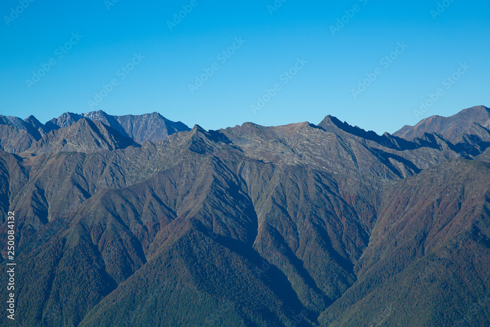 The ridges of the Caucasus Mountains. Mountains on the horizon.