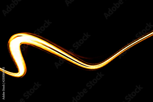 Blurred abstract motion of  light in the dark. Imagine to the flow light.