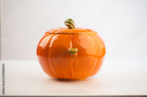 Small orange ceramic pumpkin sugar-bowl. For pumpkin porridge