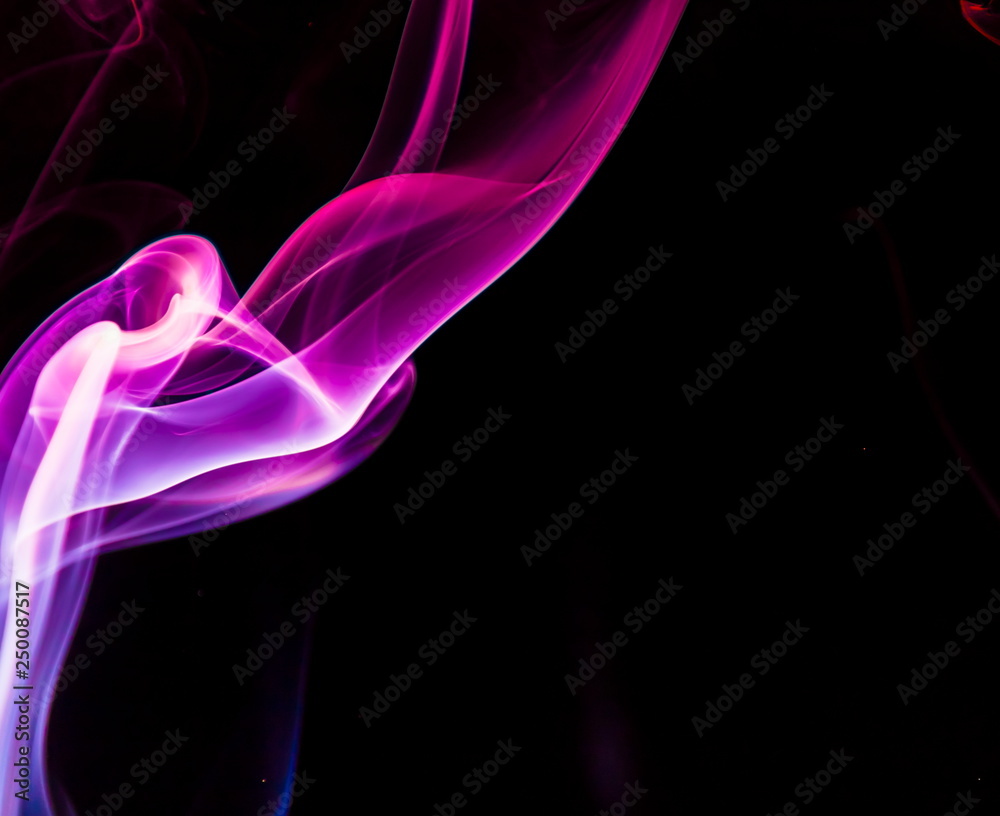 Colored smoke on black background Colored smoke on black background