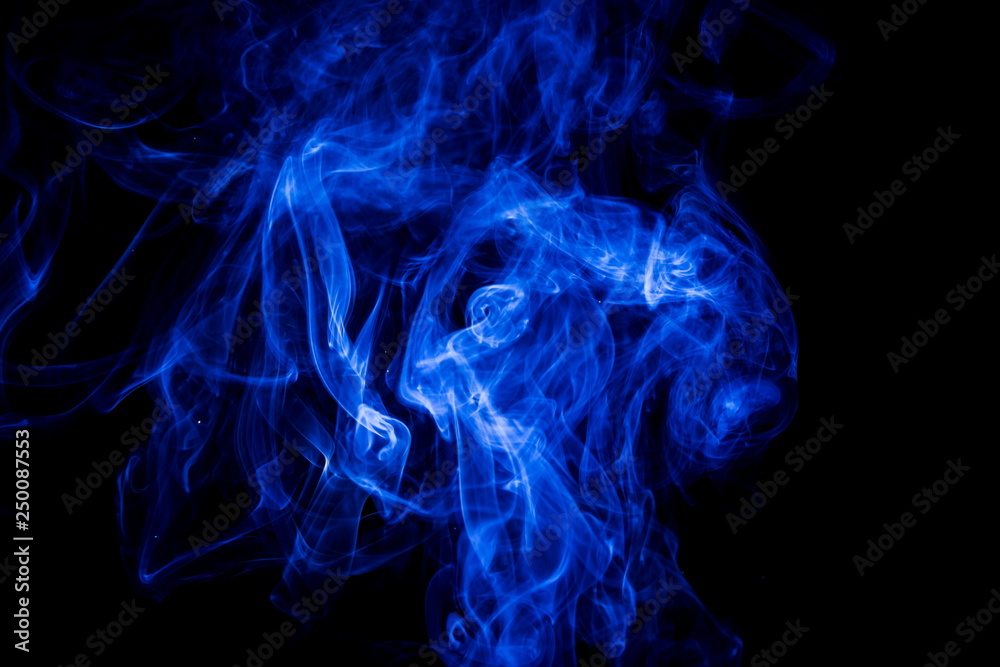 Obraz premium Blue smoke on black background