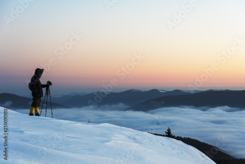 Winter mountain valleys with magical nature in the Ukrainian Carpathian Mountains with hazy dawns and fantastic evenings overlooking the snow-capped winter peaks.