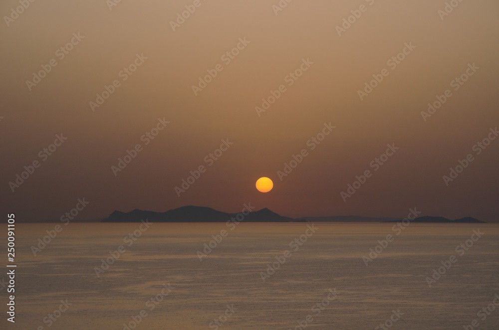 Sunset over Greek island Santorini 
