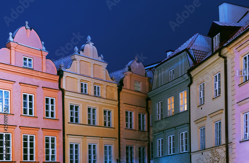 Colorful tenements in the old city of Warsaw at night
