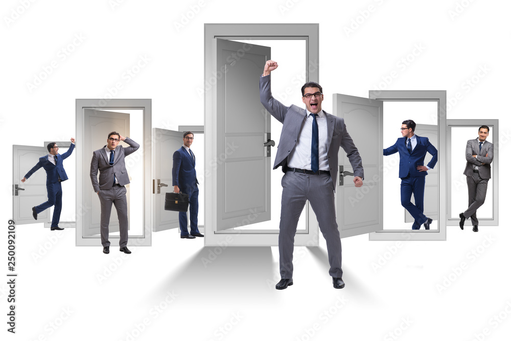 Businessman in uncertainty concept with many doors