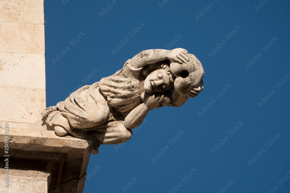 Famous stone gargoyle of the Lonja de la seda, in Valencia, Spain. It is  one of the most beautiful civilian Gothic building in Europe.