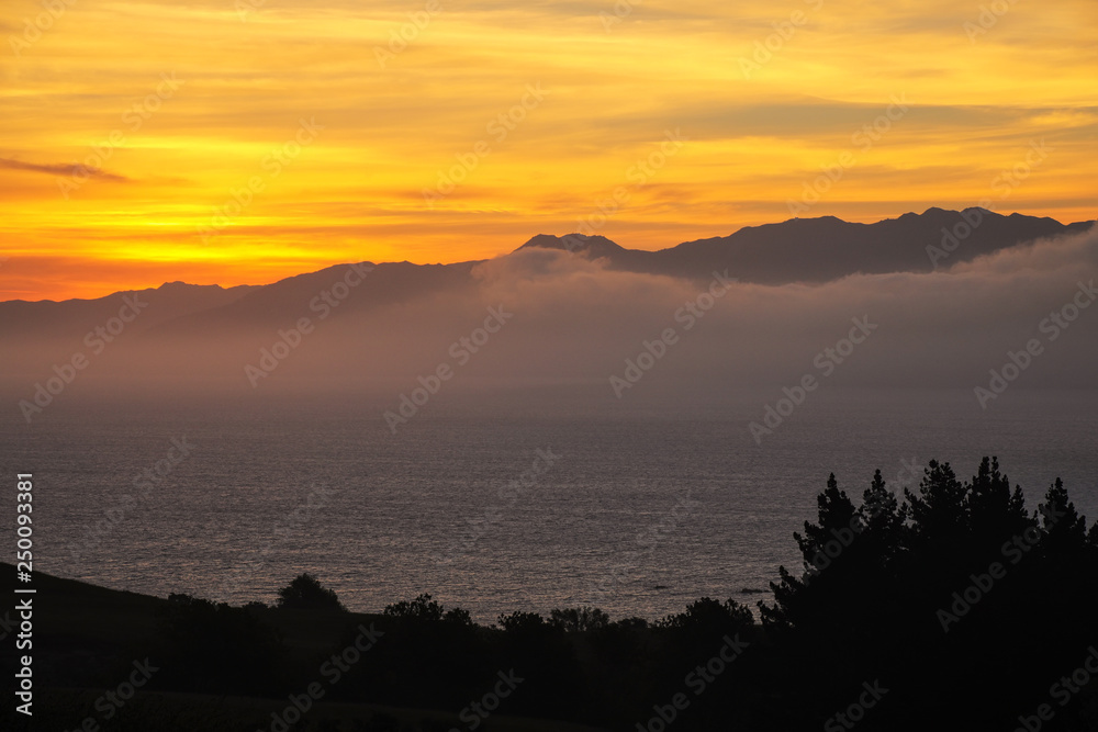 Sunset over the bay on Kaikoura peninsula, South Island, New Zealand