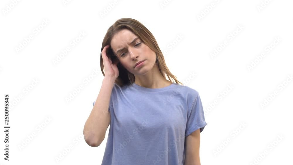Slow motion worried frustrated attractive young 25s woman run hand through hair frowning complicated, thinking intense, cross arms across chest, worry, head filled doubts, hesitations, sighing hard Slow motion worried frustrated attractive young 25s woman run hand through hair frowning complicated, thinking intense, cross arms across chest, worry, head filled doubts, hesitations, sighing hard