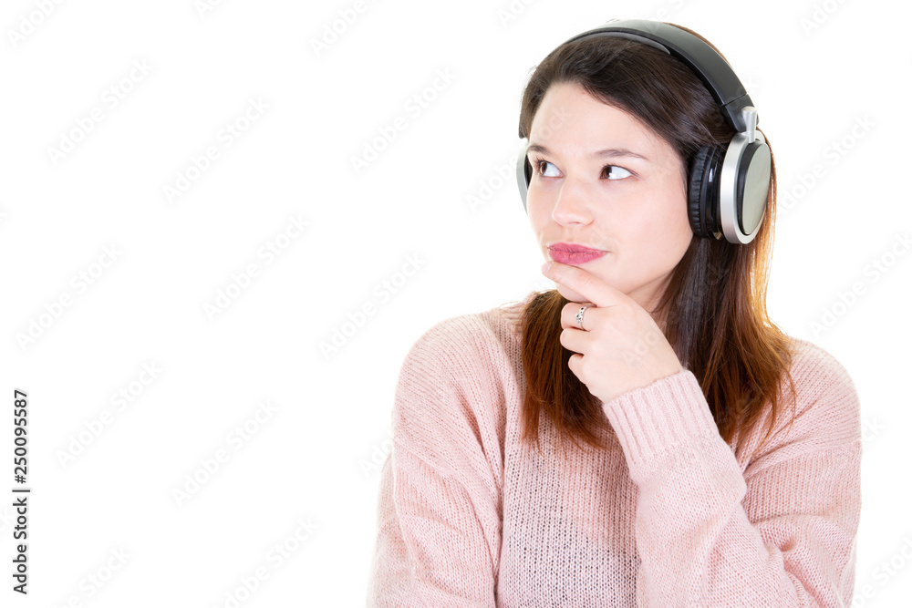 young woman with headphones looks left in copy space blank white young woman with headphones looks left in copy space blank white