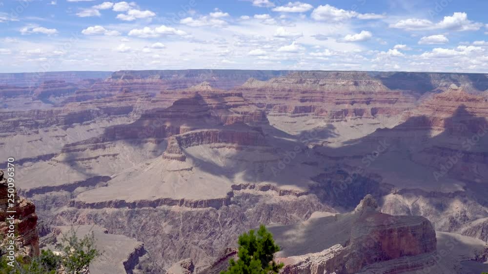 Scenic view of sunny flare in Grand Canyon national park Arizona USA. amazing wonderful nature wild desert mountain with blue sky. peaceful landscape in united states. Scenic view of sunny flare in Grand Canyon national park Arizona USA. amazing wonderful nature wild desert mountain with blue sky. peaceful landscape in united states.