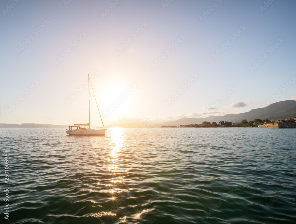 Fototapeta premium Sailing yachts in sunset light.