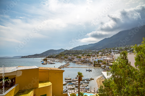 Panoramic view on picturesque port and village of Lacco Ameno, Ischia island photo