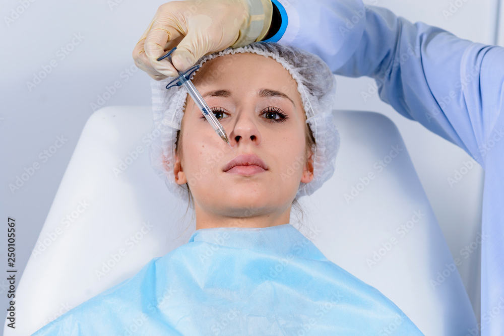 Facial rejuvenation procedure man doctor injects injections of