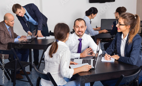 Coworkers working effectively on business project together